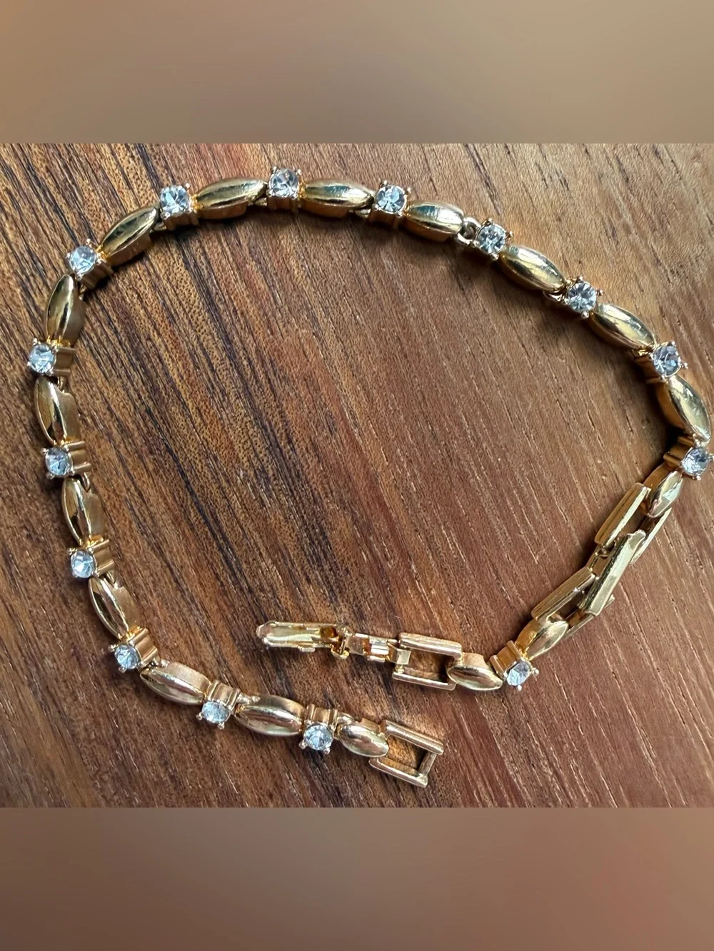 Avon Gold Tone Bracelet with Clear Rhinestones